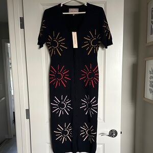 Chic Black Midi Dress with Vibrant Sunburst Patterns